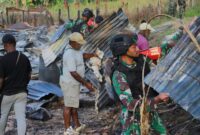 Satgaster KOOPS HABEMA tidak tinggal diam dan mengajak para warga untuk bergotong royong membersihkan puing-puing bangunan sekolah
