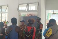 Babinsa Koramil 1710-05/Jila Sertu Febri Joe Hutubessy menghadiri acara peresmian gedung baru Puskesmas Distrik Jila, Kabupaten Mimika