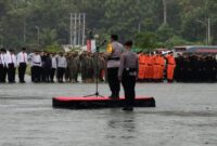 Kodim 1710/Mimika mengikuti Apel Gelar Pasukan Operasi “Mantap Praja Cartenz 2024” dalam rangka pengamanan Pemilukada 2024 di Kabupaten Mimika