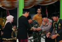 Kapolri Jenderal Polisi Drs. Listyo Sigit Prabowo bersama Panglima TNI Jenderal Agus Subiyanto mendampingi Presiden Joko Widodo (Jokowi) membuka Musabaqah Tilawatil Qur'an Nasional