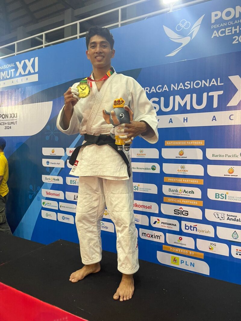 Pejudo dari Jawa Barat yang juga seorang anggota Polri, Bharaka Dewa Kadek Rama Warma Putra berhasil meraih medali emas kelas 66 kilogram