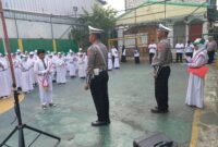 Kanit Lantas Polsek Kawasan Kali Baru Polres Pelabuhan Tanjung Priok menjadi Pembina Upacara sekaligus memberikan imbauan