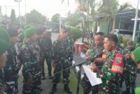 Apel kesiapan pasukan dalam rangka pengamanan Tempat Pemungutan Suara (TPS) Pemilukada BKO Polres Mimika oleh aparat TNI