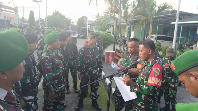 Apel kesiapan pasukan dalam rangka pengamanan Tempat Pemungutan Suara (TPS) Pemilukada BKO Polres Mimika oleh aparat TNI