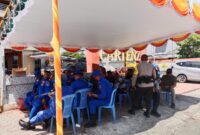 Babinsa jajaran Kodim 1710/Mimika bersama Polres Mimika melaksanakan pengamanan rapat pleno