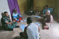 Babinsa Koramil 1710-03/Kuala Kencana, Serda Johansyah melaksanakan anjangsana ke masyarakat binaannya