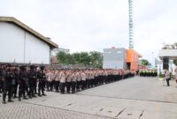 Kapolres Pelabuhan Tanjung Priok AKBP Dr. Martuasah H. Tobing, S.I.K., M.H., mempimpin Apel persiapan pengamanan aksi unjuk rasa