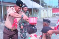 Kasdim 1710/Mimika Mayor Inf Abdul Munir mewakili Dandim 1710/Mimika Letkol Inf M. Slamet Wijaya, S.Sos., M.Han., M.A. menutup Perkemahan Sabtu Minggu