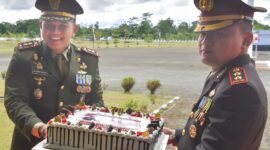 Dandim 1710/Mimika Letkol Inf M. Slamet Wijaya, S.Sos,.M.Han,.M.A menghadiri upacara peringatan HUT Bhayangkara ke-79