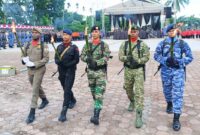 Kodim 1710/Mimika turut ambil bagian dalam kegiatan Taptu dan Pawai Obor yang digelar di Kabupaten Mimika