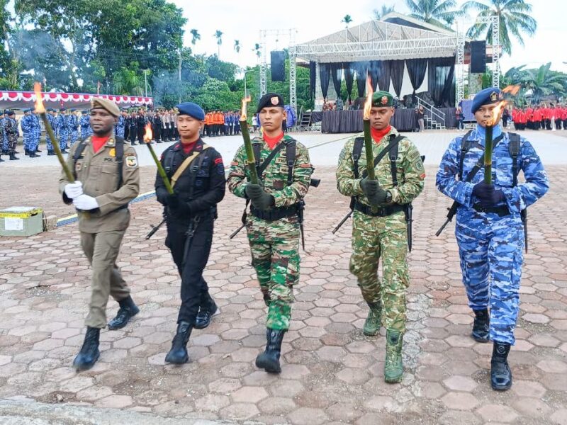 Kodim 1710/Mimika turut ambil bagian dalam kegiatan Taptu dan Pawai Obor yang digelar di Kabupaten Mimika