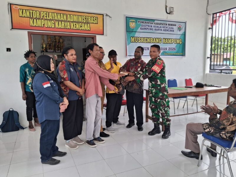 Babinsa Koramil 1710-03/Kuala Kencana Pelda Butar Butar menghadiri kegiatan Musrenbang Tingkat Kampung TA 2026