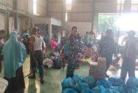 TNI melalui Kodam I/BB bergerak cepat menyalurkan 14.225 nasi bungkus kepada warga terdampak banjir di Kota Medan