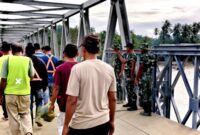 TNI membangun Jembatan Bailey di tempat tersebut dan telah merampungkan pembangunannya