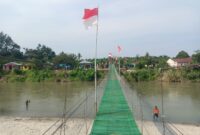 TNI melalui Satgas Gulbencal Kodam I/Bukit Barisan berhasil merampungkan renovasi Jembatan Gantung Garuda