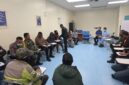 Personel Satuan Tugas (Satgas) TNI melaksanakan kegiatan mediasi bersama keluarga almarhumah Nalite Wamang di Ruang Otopsi RS ISOS Tembagapura
