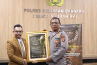 Kapolres Kawasan Bandara I Gusti Ngurah Rai, Kombes Pol. I Komang Budiartha, S.I.K., resmi menerima penghargaan Leadership Awards 2026